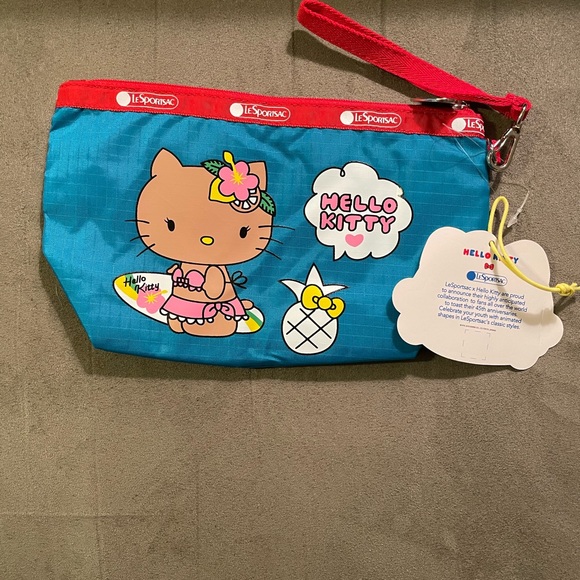NWT HELLO KITTY X LESPORTSAC HAWIIAN WRISTLET - Picture 2 of 6